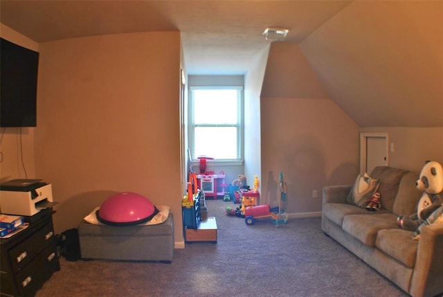 recreation room with dark carpet and lofted ceiling