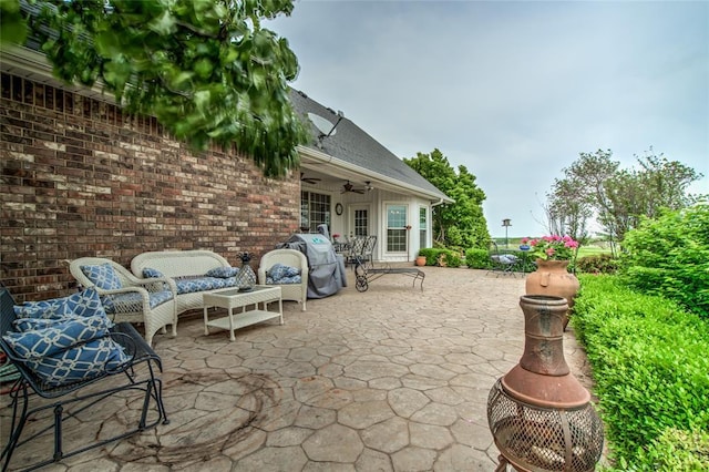 view of patio with ceiling fan and outdoor lounge area