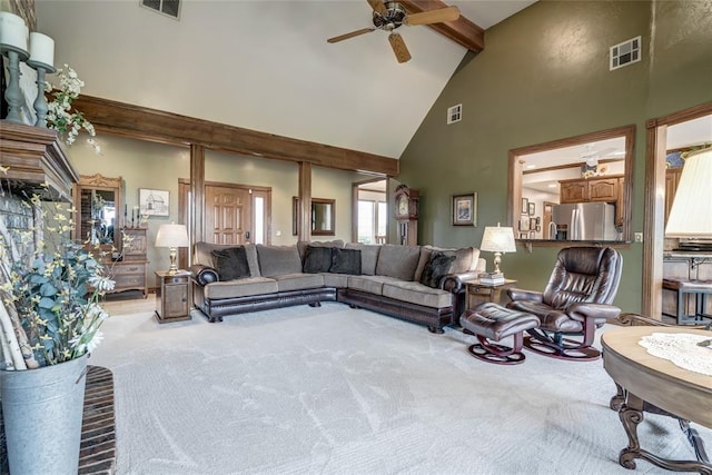 carpeted living room featuring high vaulted ceiling, ceiling fan, beam ceiling, and visible vents