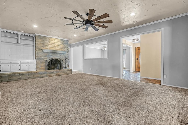 unfurnished living room featuring light carpet, baseboards, ornamental molding, a textured ceiling, and a brick fireplace