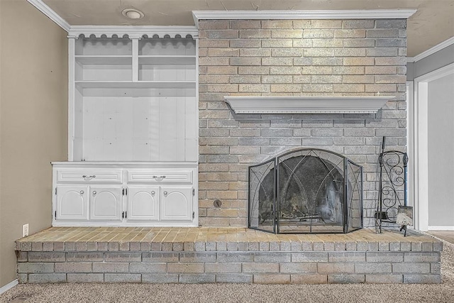 details featuring ornamental molding and a fireplace