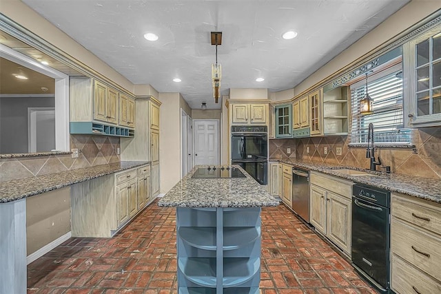 kitchen featuring a center island, open shelves, glass insert cabinets, a sink, and black appliances