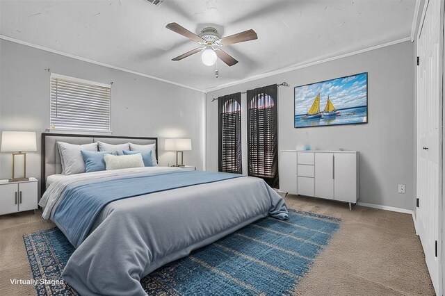 bedroom featuring carpet floors, baseboards, ornamental molding, and a ceiling fan