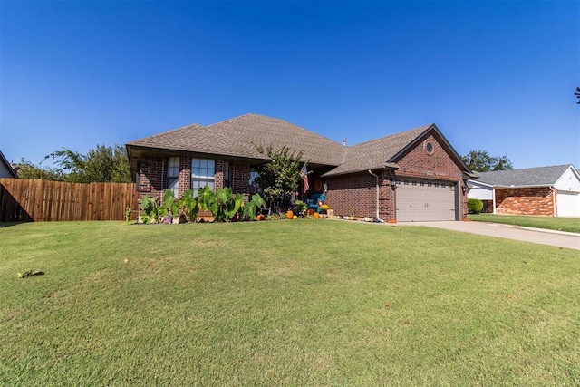 ranch-style house with a front yard and a garage