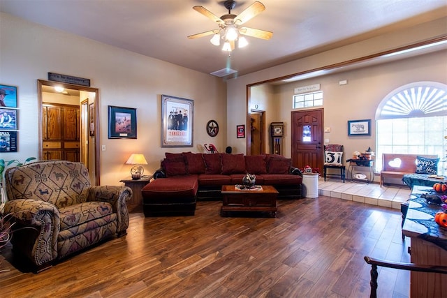 living room with wood-type flooring and ceiling fan