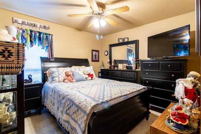 tiled bedroom with ceiling fan