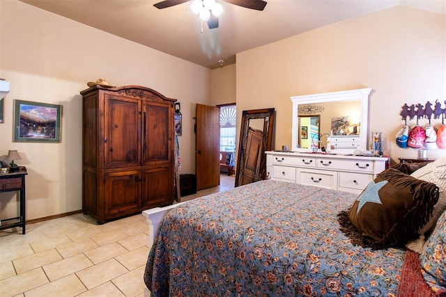 bedroom featuring ceiling fan and lofted ceiling