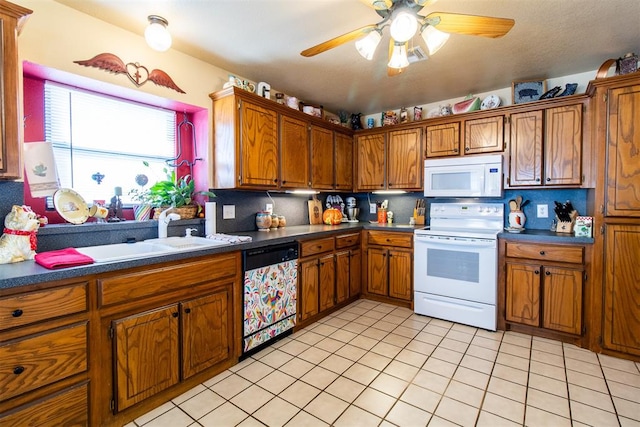 kitchen with ceiling fan, sink, backsplash, white appliances, and light tile patterned floors