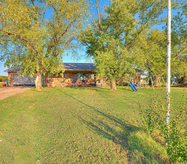 view of yard with a playground