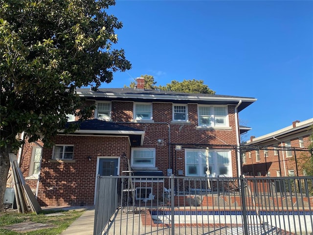 view of front of property with solar panels