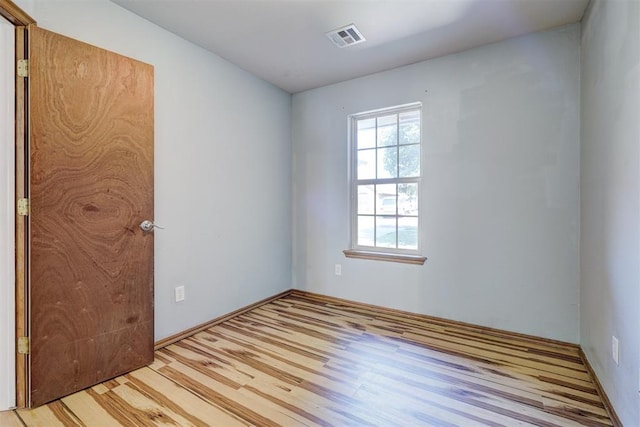 empty room featuring light hardwood / wood-style floors