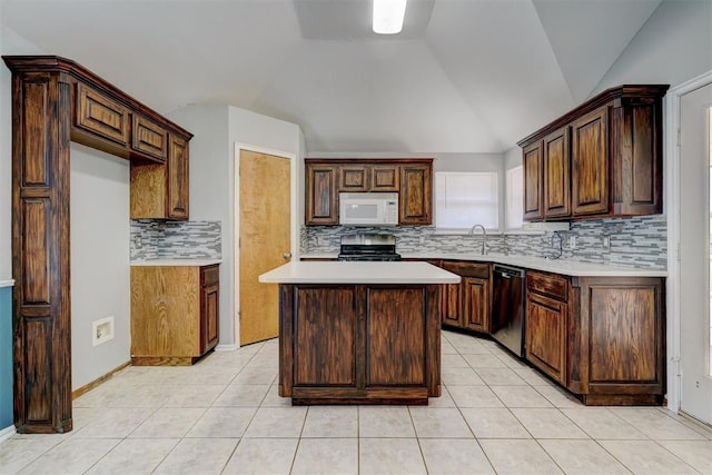 kitchen featuring a center island, vaulted ceiling, stainless steel dishwasher, decorative backsplash, and black range with gas cooktop