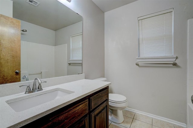 full bathroom featuring tile patterned flooring, vanity, toilet, and  shower combination