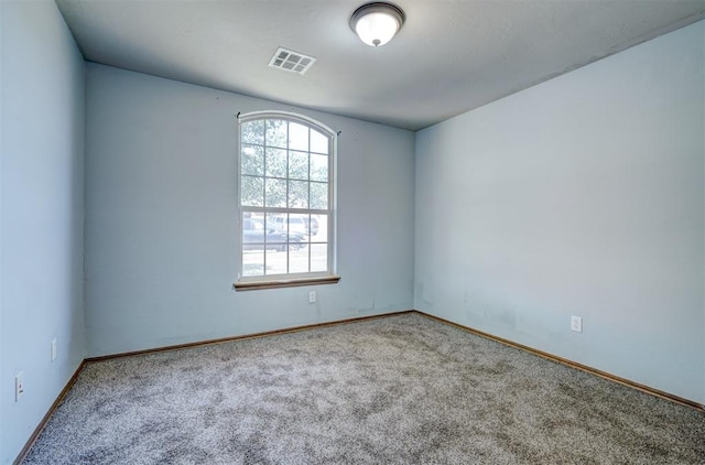 empty room with carpet floors