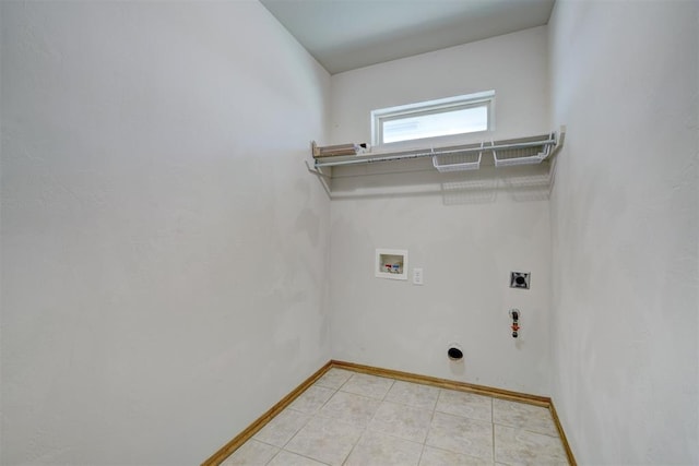 washroom featuring washer hookup and electric dryer hookup