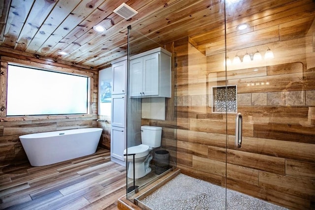 bathroom with wood walls, hardwood / wood-style flooring, toilet, independent shower and bath, and wood ceiling