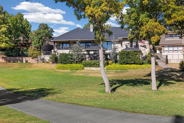 view of front of home with a front yard