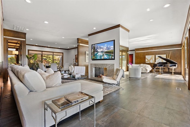 living room with ornamental molding