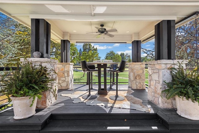 wooden terrace with ceiling fan