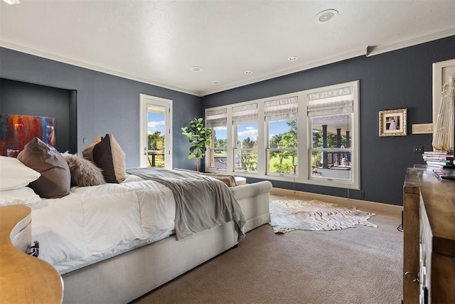 bedroom featuring carpet flooring, access to exterior, and crown molding