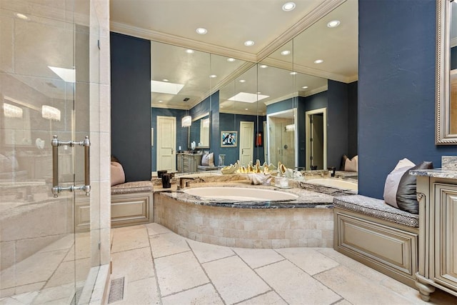 bathroom with vanity, crown molding, and plus walk in shower