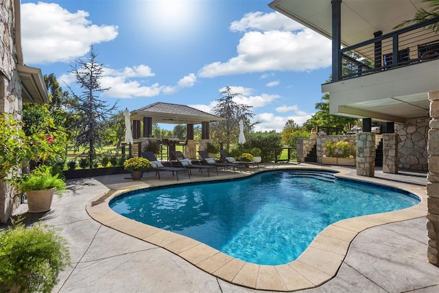 view of pool with a gazebo and a patio area