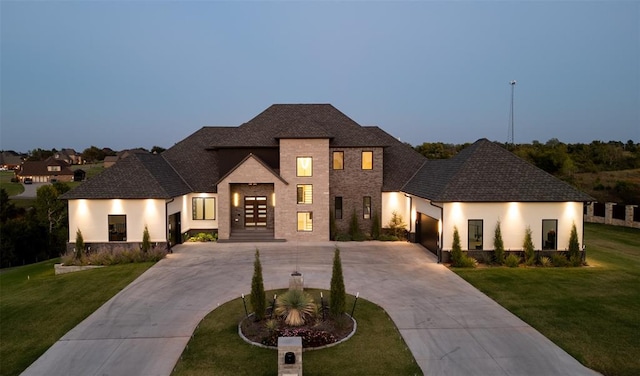 view of front of home with a lawn