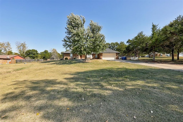 view of yard featuring a garage