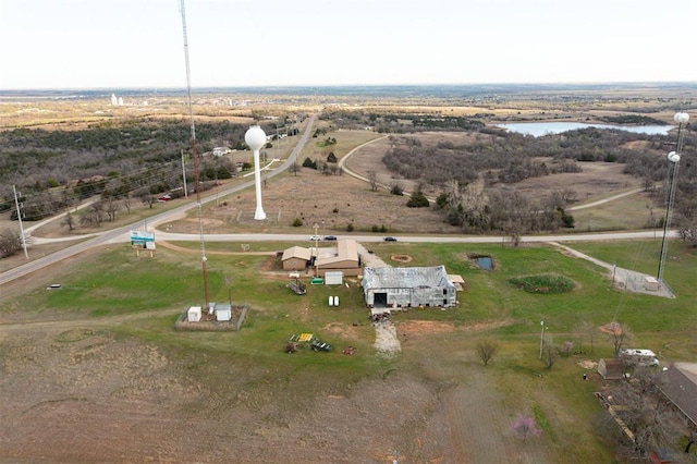 drone / aerial view with a rural view and a water view