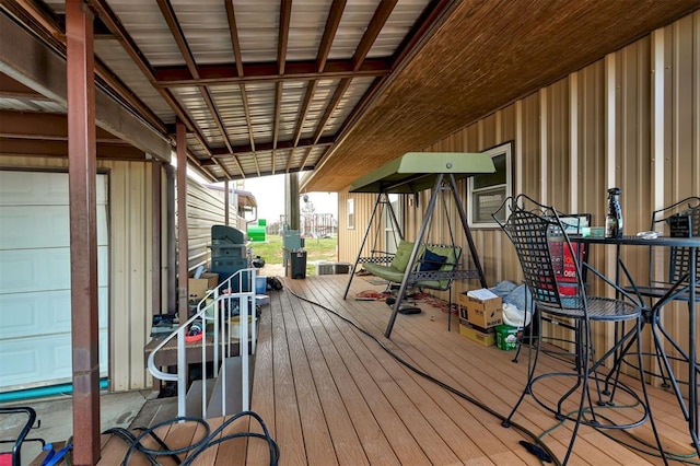 wooden deck with a grill