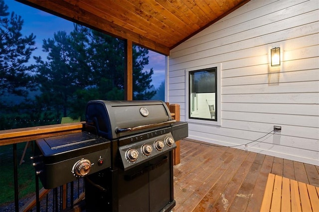 patio terrace at dusk with a wooden deck