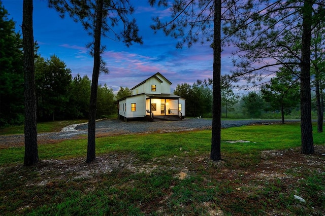 exterior space with a yard and covered porch