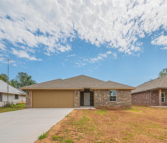 view of front of property featuring a garage