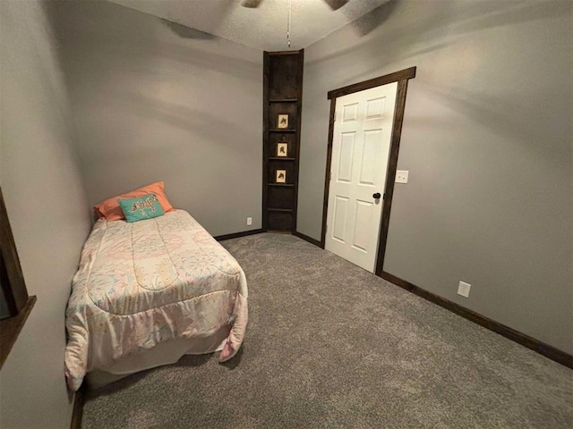 bedroom with ceiling fan and carpet