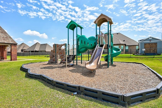 community playground with fence and a yard