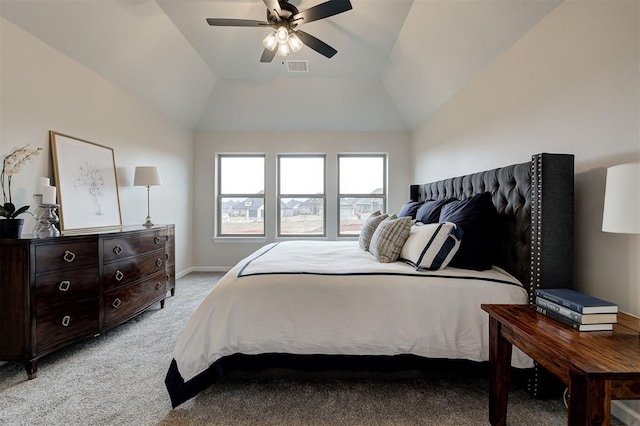 bedroom featuring lofted ceiling, visible vents, light carpet, ceiling fan, and baseboards