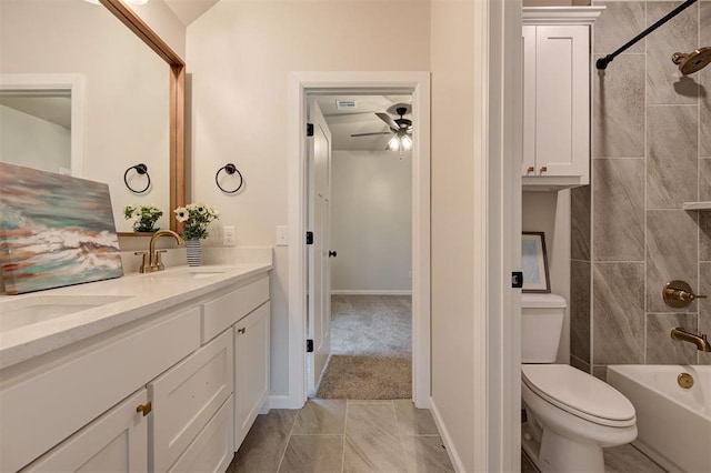 full bathroom featuring shower / bathtub combination, toilet, a sink, a ceiling fan, and double vanity