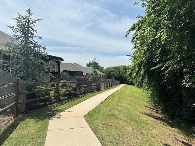 surrounding community featuring a lawn