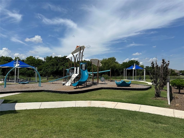 view of playground with a yard