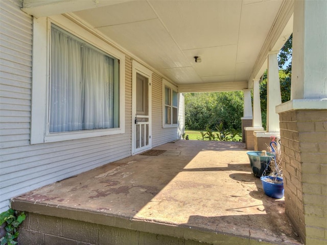 view of patio featuring a porch