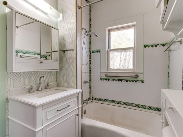 bathroom featuring vanity and shower / bathtub combination