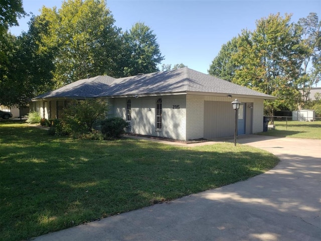 view of side of home featuring a yard