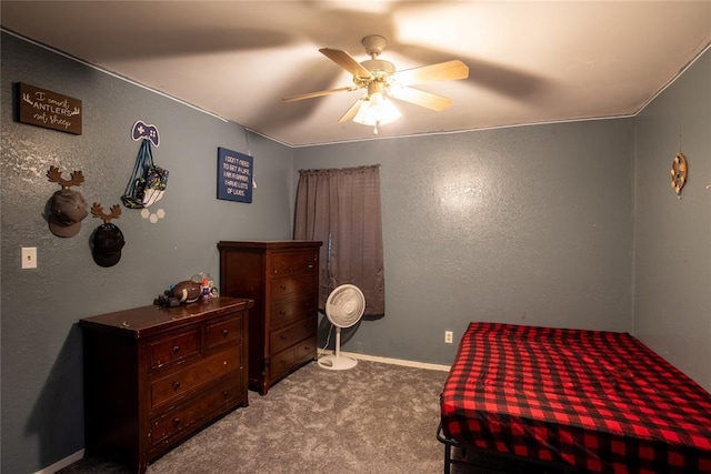 bedroom featuring light carpet and ceiling fan