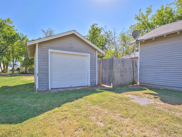 garage with a lawn