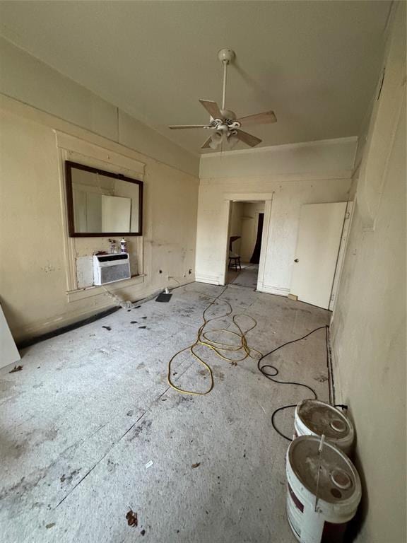 unfurnished living room featuring ceiling fan