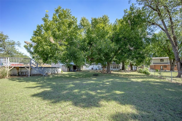 view of yard with a wooden deck