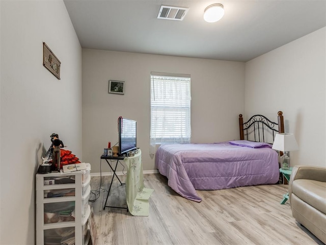 bedroom featuring light hardwood / wood-style flooring