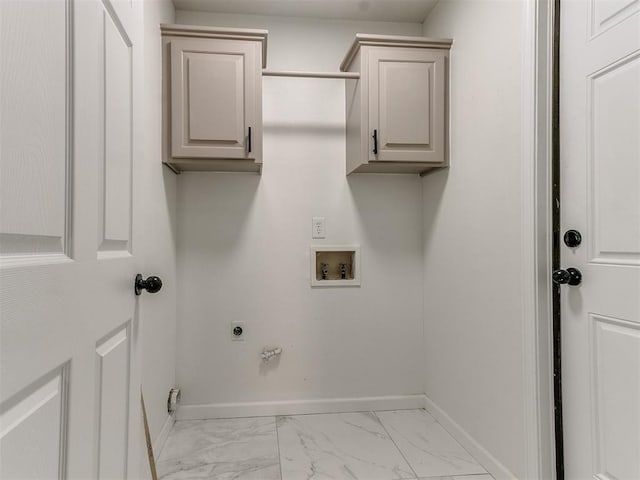 washroom featuring cabinets, hookup for a washing machine, and electric dryer hookup