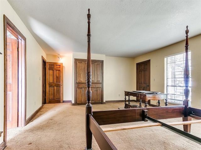 interior space with a textured ceiling