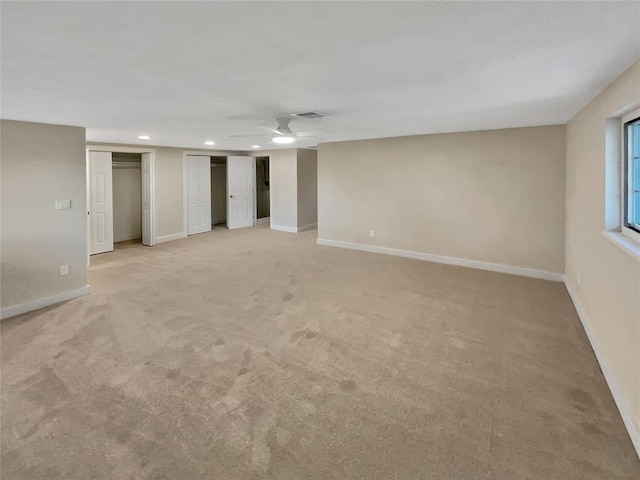 interior space featuring ceiling fan